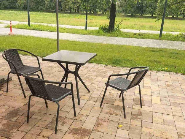 Completed concrete patio with outdoor seating area and clean paver layout in Strongsville, OH